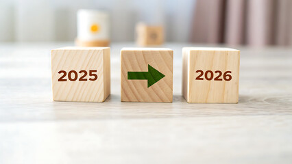 Minimalist Wooden Blocks Transition from 2025 to 2026, perfect for New Year’s concepts, business forecasts, or goal-setting visuals.