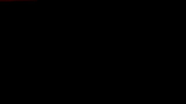 The film burn scratch overlay effect in black background.