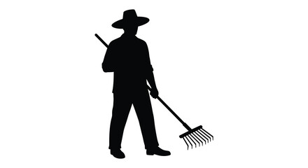 a farmer silhouette holding a rake in field