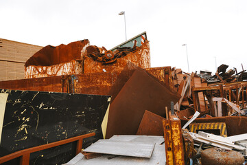 rusty orange metal scrap yard