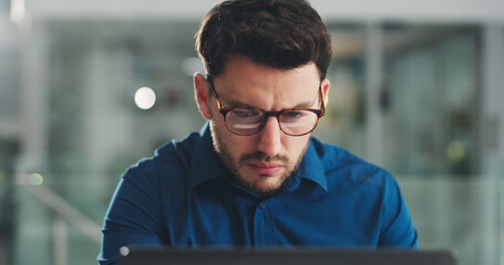 Laptop, reading and glasses with business man in office for research, payroll manager and audit...