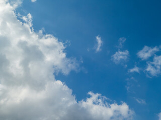 Bright Blue Sky with Fluffy Clouds