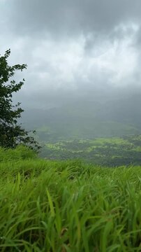 Vertical timelapse of Matheran mountain range with moving clouds, Maharashtra