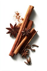Spiced Cinnamon Sticks And Star Anise On White Background
