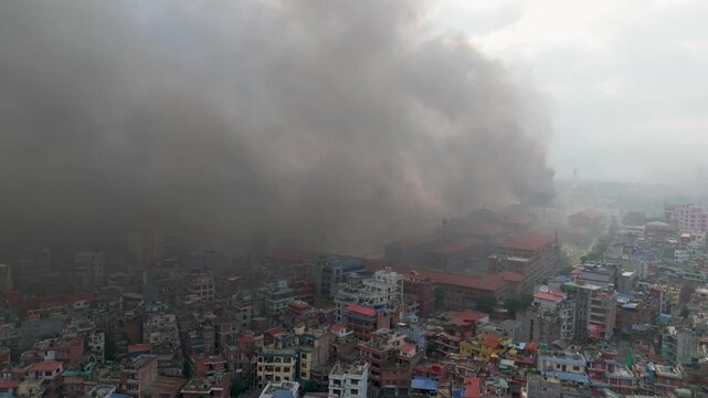Kathmandu in Turmoil: Smoke Over Prime Minister's Office During Protests. Protesters Setting Fire to Singha Durbar-Aerial Drone Footage. Kathmandu Under a Haze of Smoke During Protests