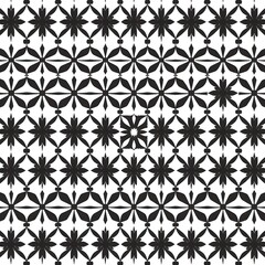 Fototapeta premium Geometric repeating pattern of stylized floral motifs on a white background.