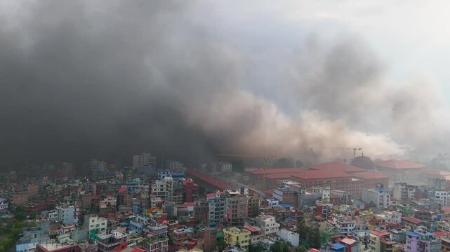 Kathmandu in Turmoil: Smoke Over Prime Minister's Office During Protests. Protesters Setting Fire to Singha Durbar-Aerial Drone Footage. Kathmandu Under a Haze of Smoke During Protests