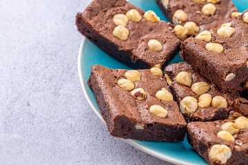 Homemade chocolate brownie photography . Top view on rustic background.Rich chocolate brownie , showcasing its dense texture and glossy surface, professional food photography.