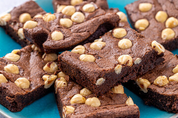 Homemade chocolate brownie photography . Top view on rustic background.Rich chocolate brownie , showcasing its dense texture and glossy surface, professional food photography.