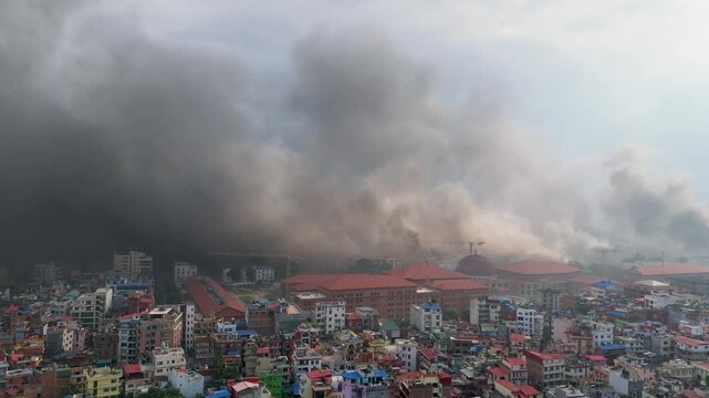 Kathmandu in Turmoil: Smoke Over Prime Minister's Office During Protests. Protesters Setting Fire to Singha Durbar-Aerial Drone Footage. Kathmandu Under a Haze of Smoke During Protests