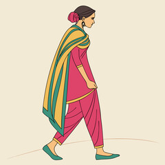 Woman in a salwar kameez walking, showcasing traditional indian fashion style