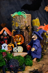 Halloween Eve fun - skulls, ghosts, pumpkins, spiders and other halloween characters in a dark...