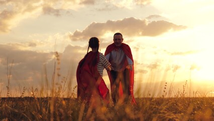 happy family, father daughter play sunset, child dream, running kid child dad, superhero red cape dream fly, parent hug, people park, superhero capes flowing summer breeze, bright red capes against