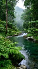 Obraz premium Serene tropical forest stream surrounded by lush greenery in misty atmosphere