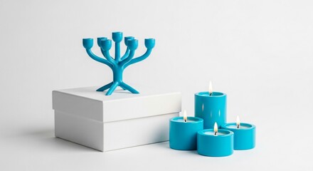 Bright Teal Menorah with Lit Candles on White Box