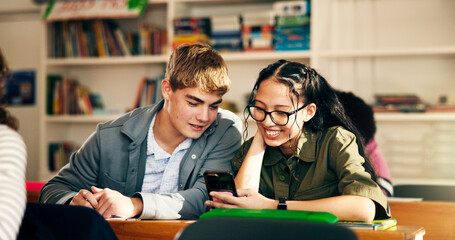 High school, friends and phone in classroom for education, learning and happy with online course. Students, teen boy and girl with mobile for scholarship, research project and app for development © peopleimages.com