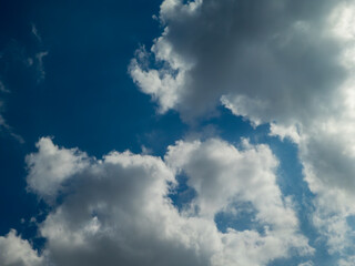 Dramatic Sky with Fluffy White Clouds.