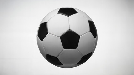 Naklejka premium Classic Black and White Football on White Background