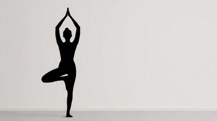 Silhouette of Person Performing Tree Pose in Yoga
