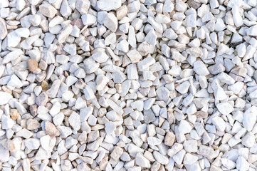 decorative gravel close up. marble chips stone fraction background texture.