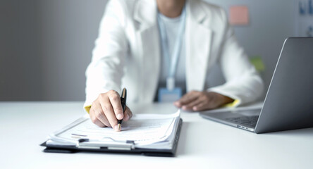 Business woman employer holding resume hiring recruit looking cv resume to hire candidates, analyzing information before job interview. Recruitment concepts