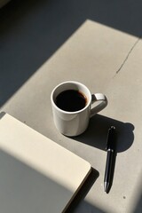 Curated aesthetic lifestyle still life with a sophisticated, muted color palette, featuring coffee, technology, and natural textures.