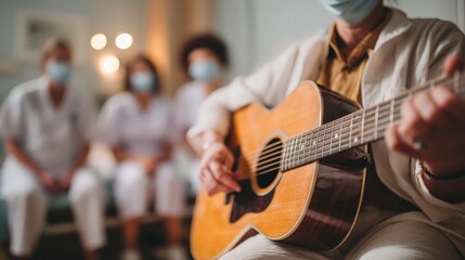 Therapist performing gentle music with acoustic guitar for recovering patients, hospital nurses observing nearby