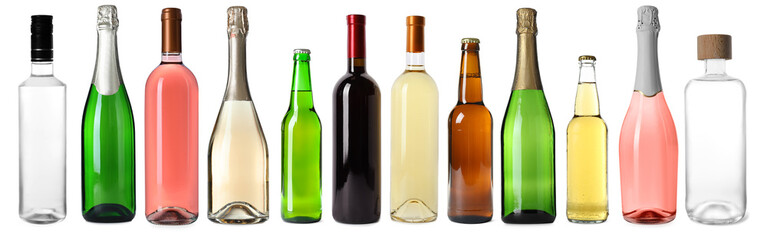 Bottles with different alcoholic drinks isolated on white, set