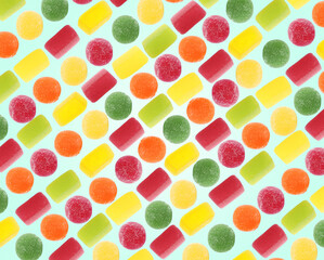 Pattern of sweet jelly candies on light blue background