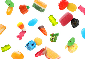 Different jelly candies falling against white background