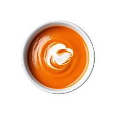 Top View of a Bowl of Creamy Orange Soup with a Swirl of Cream