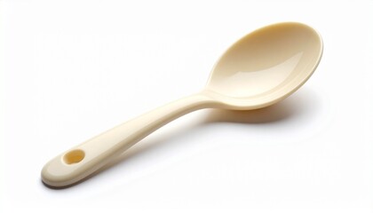Cream-colored plastic spoon with round bowl and curved handle, isolated on white background