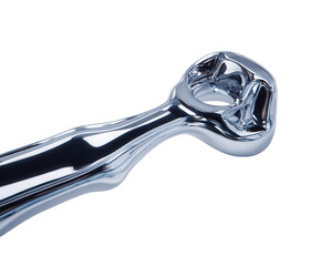 Close-up of a Chrome Metallic Fist-Shaped Tool on Black Background