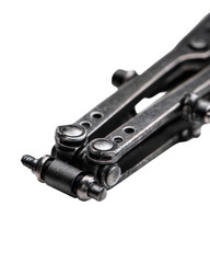 Close Up of Grey Metal Pliers on Black Background