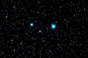 Deep space, three bright stars, many smaller stars