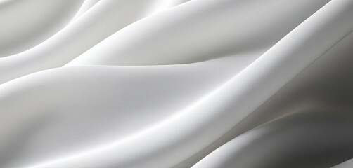 Obraz premium Abstract white fabric with soft flowing folds and delicate subtle shadows, forming a minimalist elegant background with gentle movement and texture.