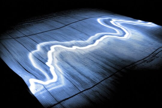 Light-blue graph line on dark grid