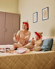 Mother and daughter bonding with beauty care in cozy home setting