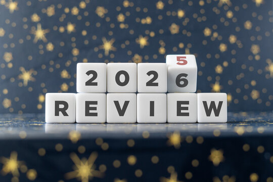 Flipping of 2024 to 2025 on white blocks. 2024 business and customer review for business strategic planning in the next year 2025. End of the year business concept.