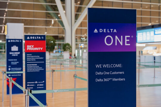 delta air lines check-in signs for delta one and sky priority at incheon airport terminal 2 - Incheon, South Korea - September 5 2025