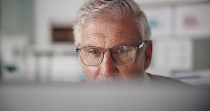 Business man, computer and reading in office for proofreading, fast checking facts and verify info. Editor, mature person and tech at publishing agency for publication accuracy and submission review