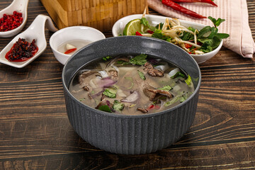 Vietnamese Pho Bo soup with beef and noodles