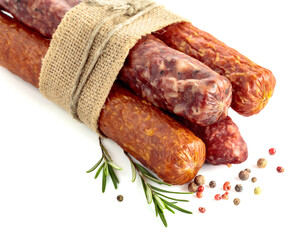 Dry cured sausages with peppercorns and rosemary.