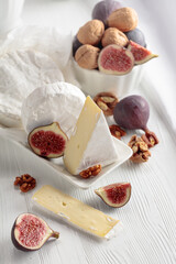 Camembert cheese with figs and walnuts.