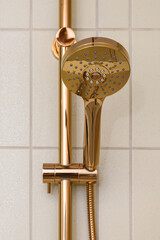 Modern Bathroom Detail: Stylish Copper-Toned Shower Fixture