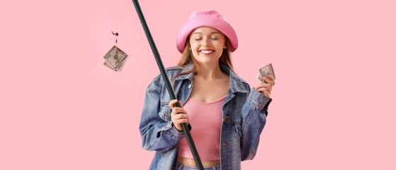 Happy young woman with fishing rod and money on pink background