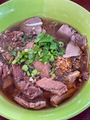 The closed up of Thai noodles with meat ball. Select and soft focus.