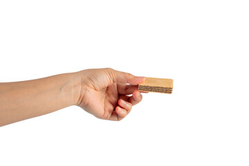 Wafer biscuit with chocolate cream and hand isolated on transparent background
