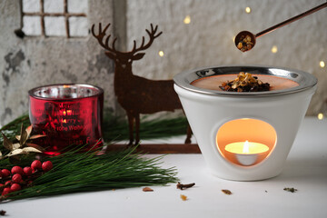 Christmas incense ritual - placing incense with a spoon