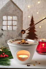 Christmas incense ritual - placing incense with a spoon